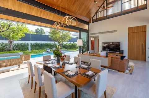 AVANA villa: dining area opening to the pool