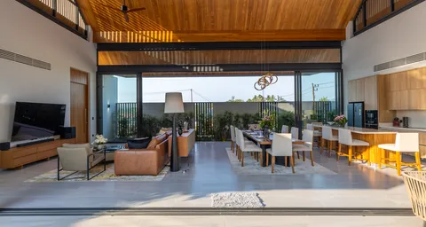 AVANA villa: open-plan living, dining and kitchen